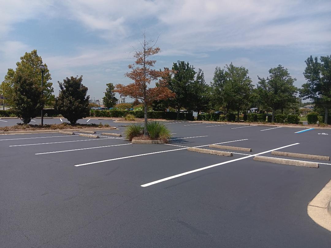 Superior Crack Filling, Seal Coating & Parking Lot Re-Striping Project Successfully Completed in Pensacola, FL
